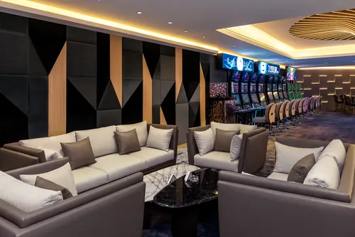 The lounge sofas at the edge of the gaming floor